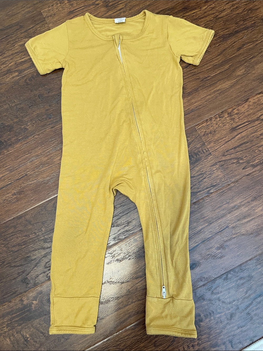 Larkspur Zip-Front Kids One-Piece Bodysuit in Mustard Yellow